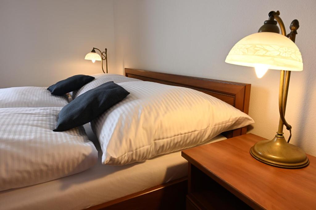 Postel nebo postele na pokoji v ubytování Hotel Eufória