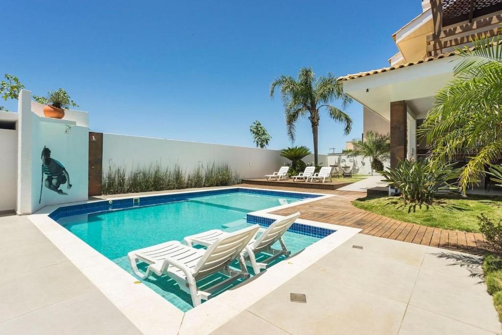 Swimmingpoolen hos eller tæt på Casa do Artista a 60m do mar, piscina, 4 quartos