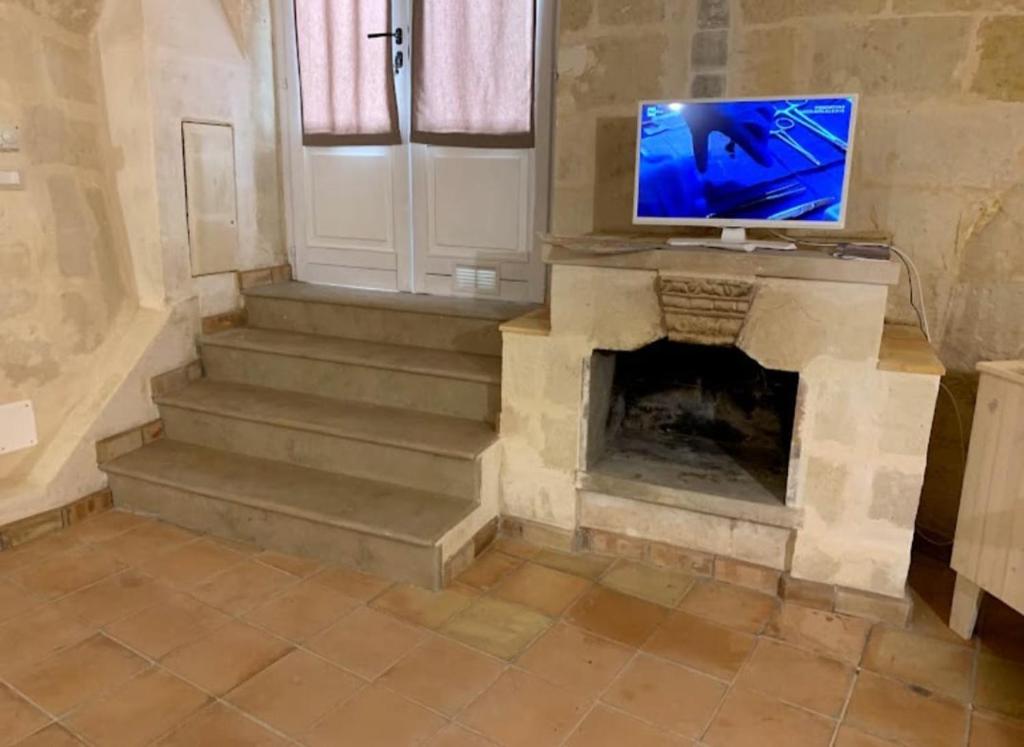 TV a/nebo společenská místnost v ubytování Casa Ferri