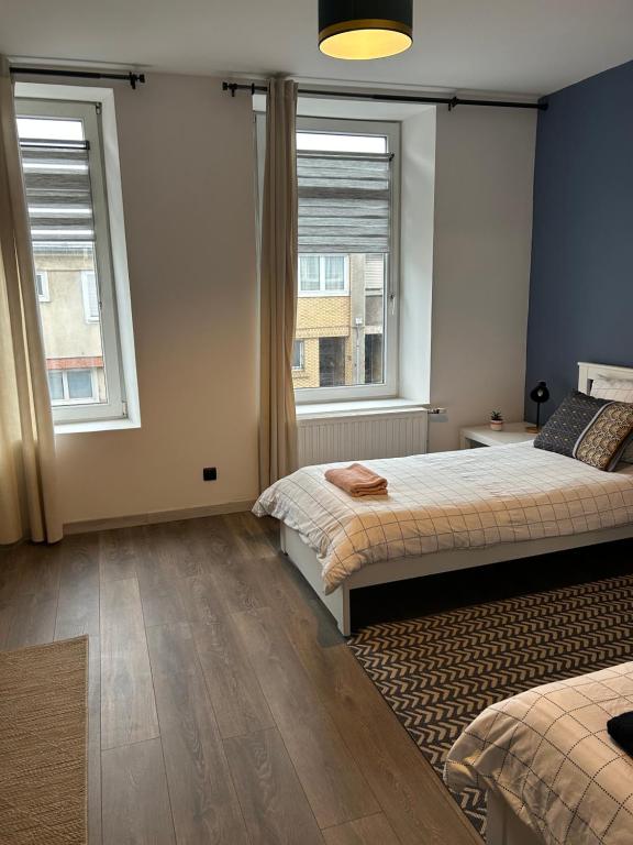 Posteľ alebo postele v izbe v ubytovaní La Maison de la Côte