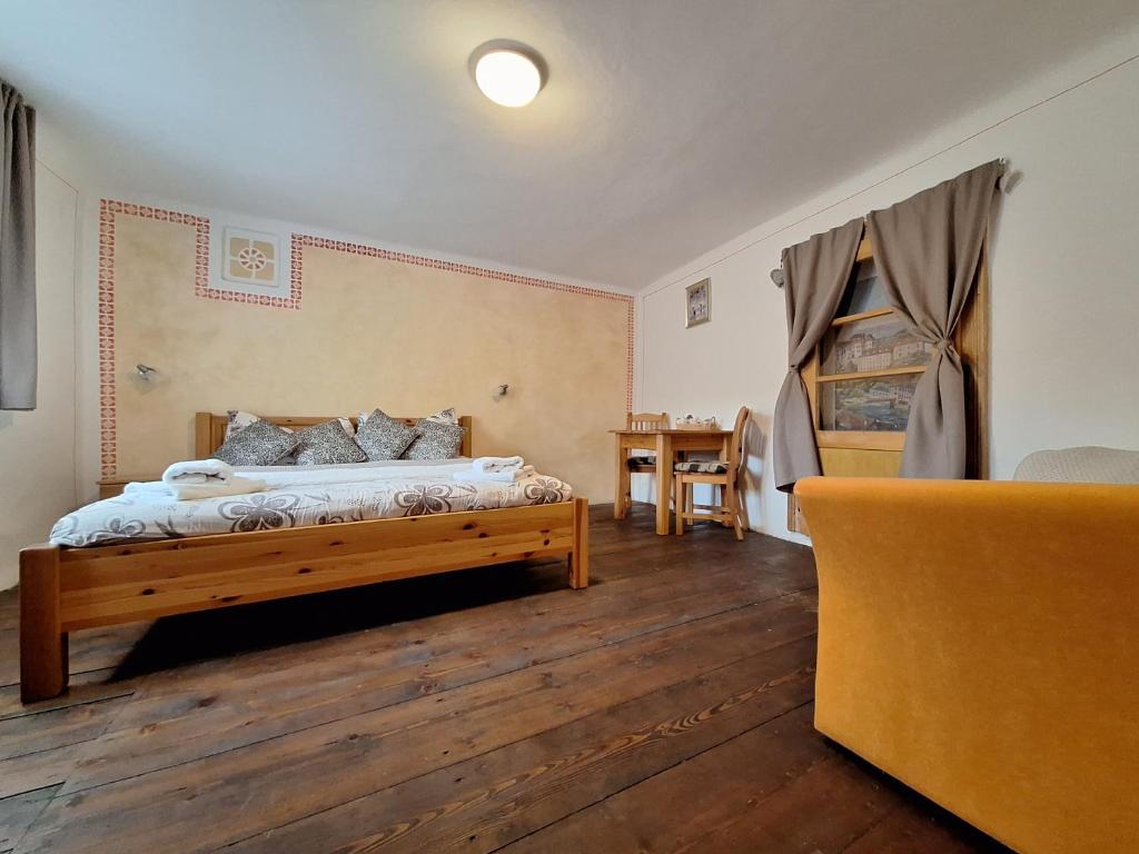 Postel nebo postele na pokoji v ubytování Penzion V Suchu