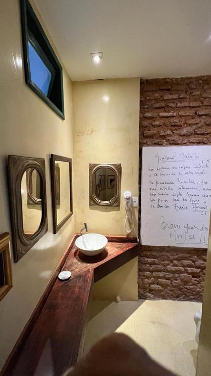 Postel nebo postele na pokoji v ubytování Apto com Arte no Pelourinho