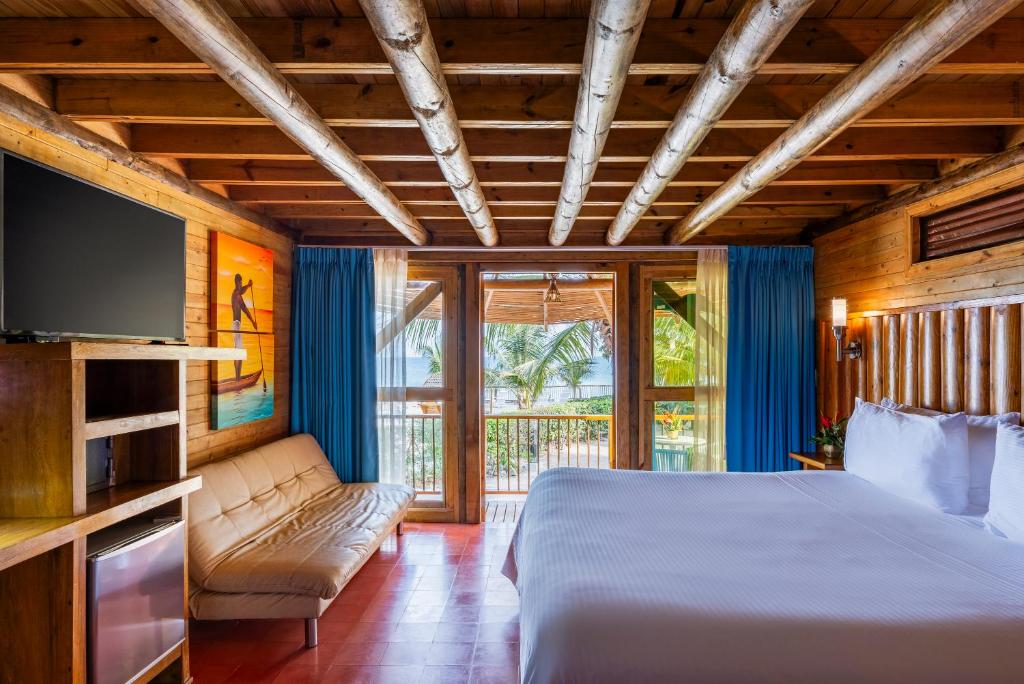 Postel nebo postele na pokoji v ubytování Hotel Isla del Encanto