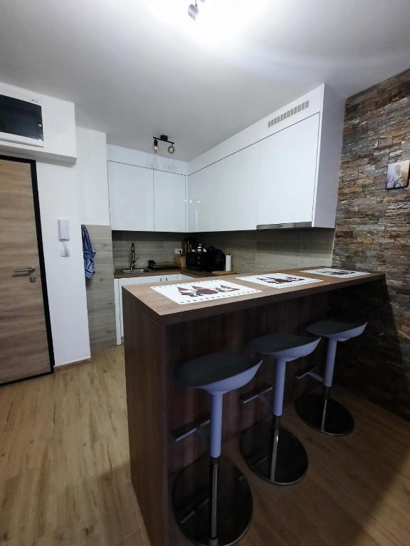Kuchyň nebo kuchyňský kout v ubytování APARTMAN GREEN HILLS 20