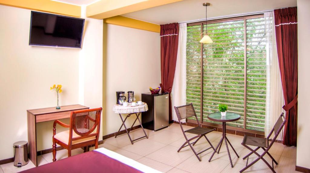 TV a/nebo společenská místnost v ubytování Hotel D'Carlo Class