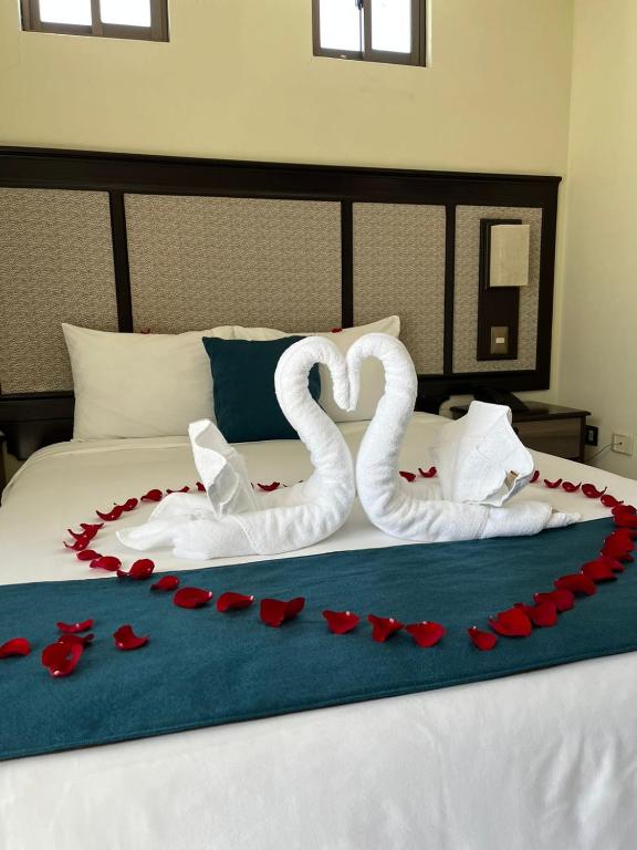 Postel nebo postele na pokoji v ubytování Hotel D'Carlo Class