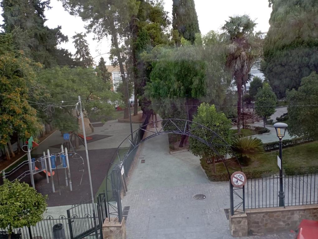 a playground with a slide in a park at Apartamento Duquesa in Rute