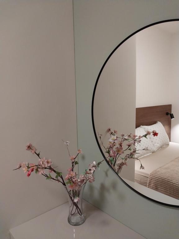 Postel nebo postele na pokoji v ubytování Lider Lux Apartman