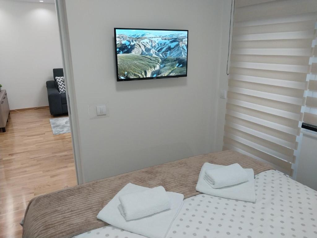 Postel nebo postele na pokoji v ubytování Lider Lux Apartman