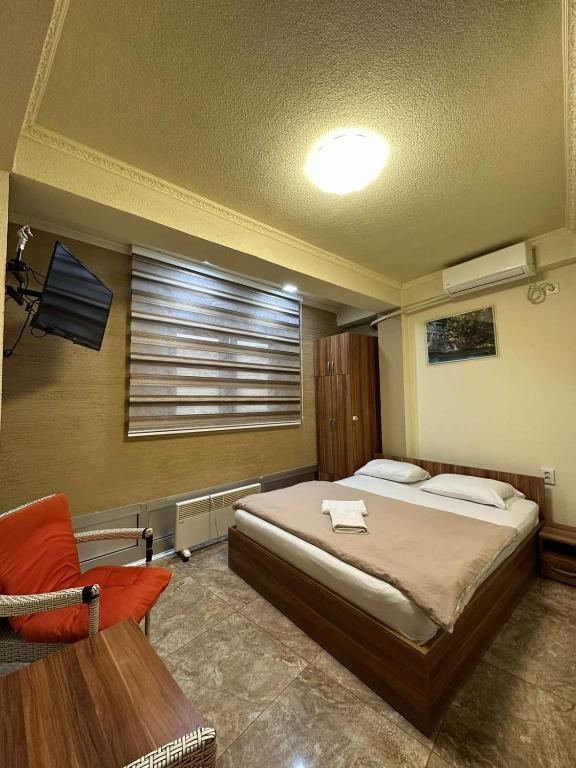 TV a/nebo společenská místnost v ubytování Hotel Atika