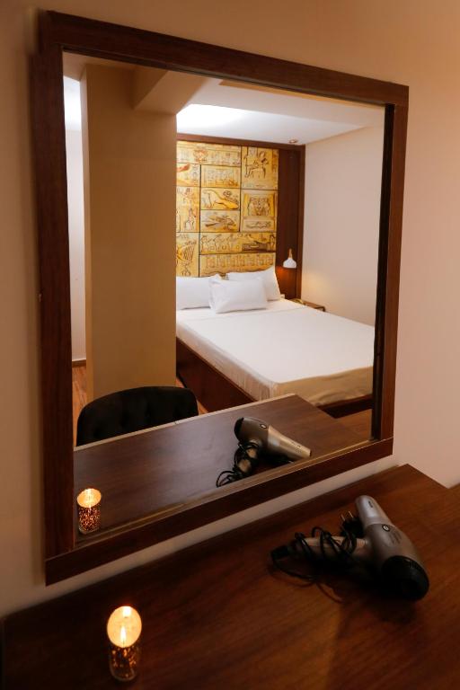 Postel nebo postele na pokoji v ubytování Sky Pyramids View Inn