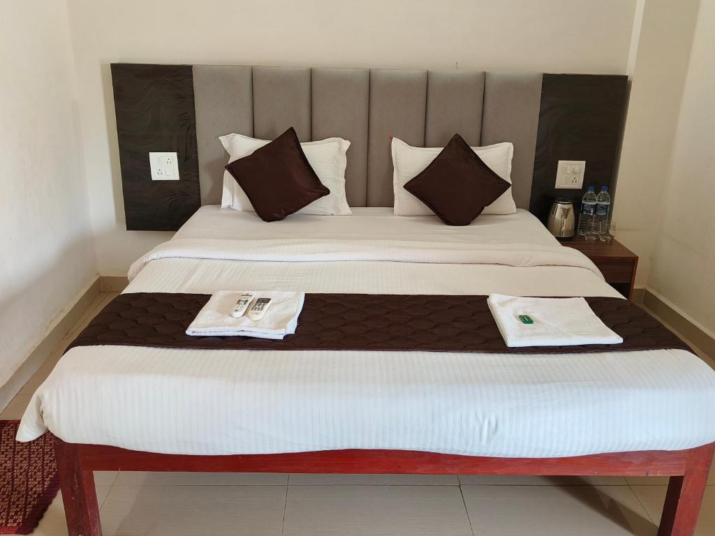 Postel nebo postele na pokoji v ubytování Hotel Baga inn