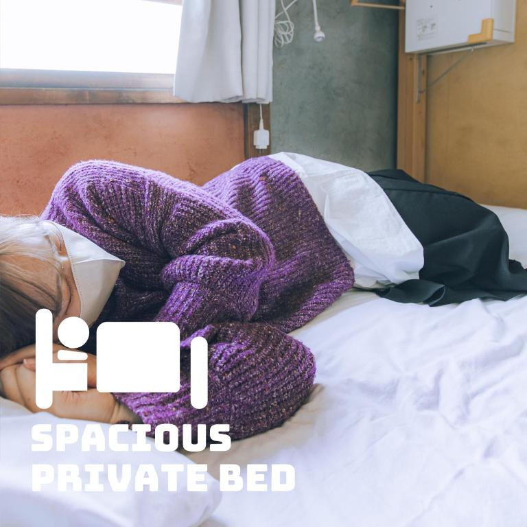 Postel nebo postele na pokoji v ubytování LovesunshineBackpackers