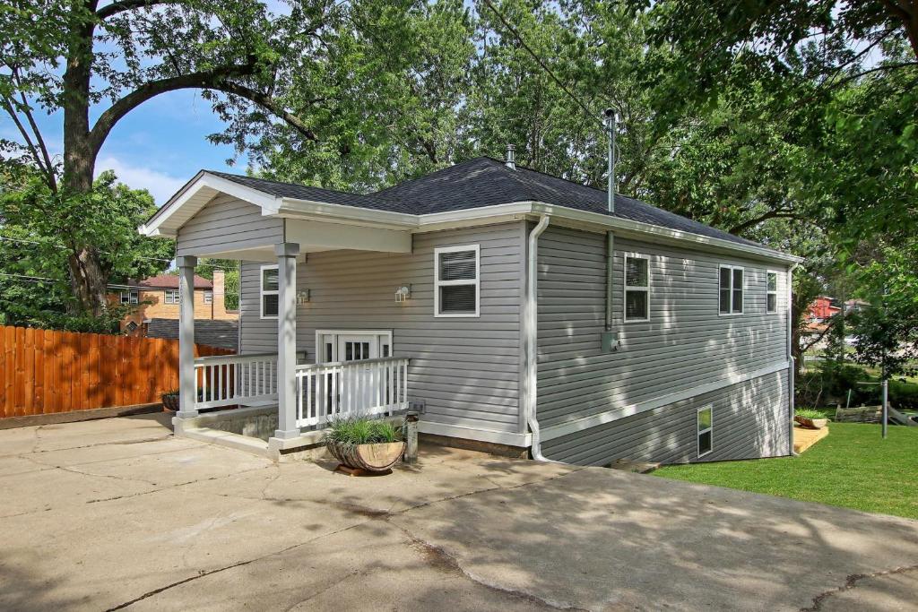 a small house with a porch in a yard at 26211 Antioch in Antioch