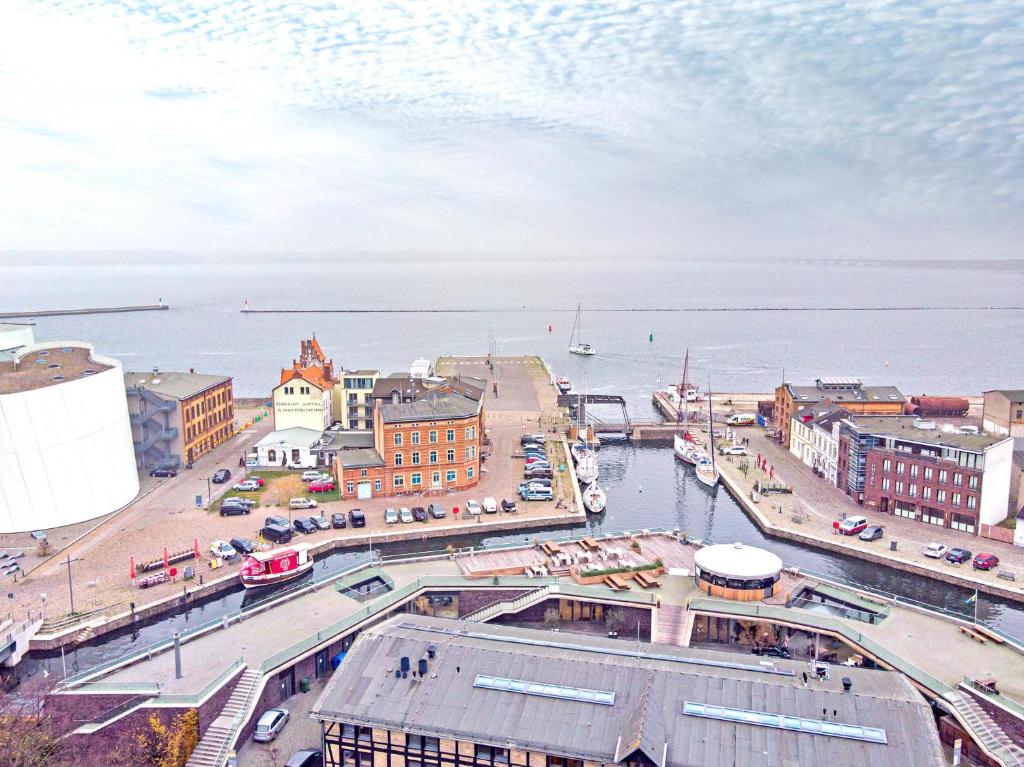 an aerial view of a city with a body of water at Stralsund - Haus Gohr, Quartier 5 in Stralsund