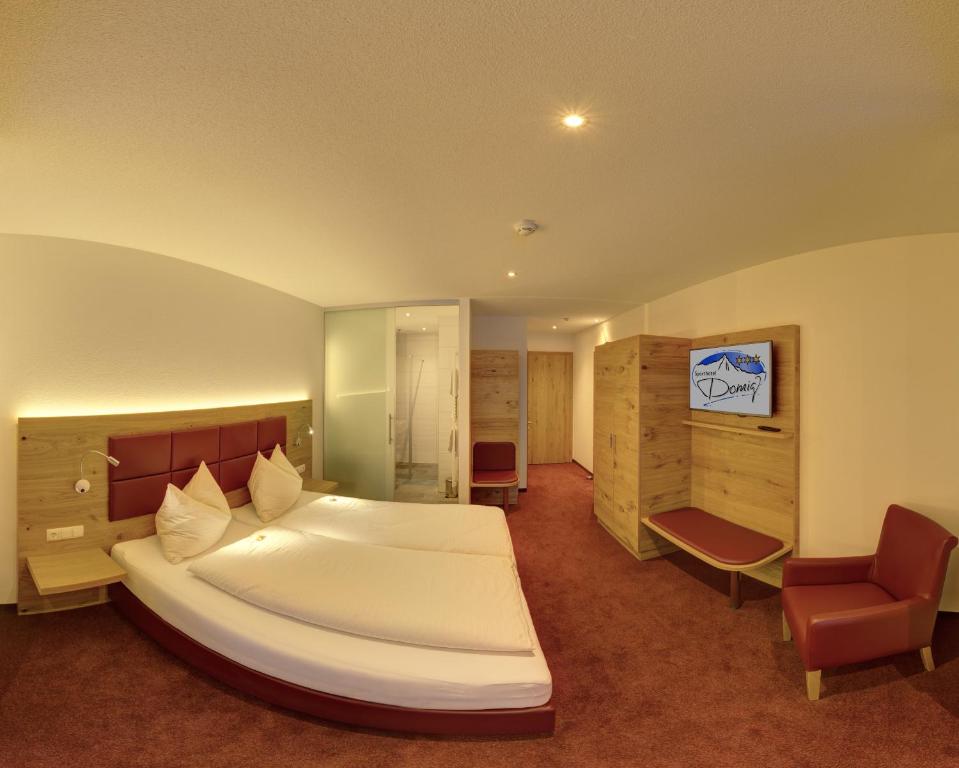 Postel nebo postele na pokoji v ubytování Natur-Genuss-Hotel Sonnasita