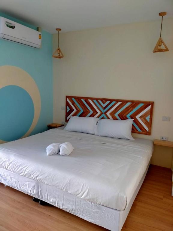 Postel nebo postele na pokoji v ubytování Castaway's 420