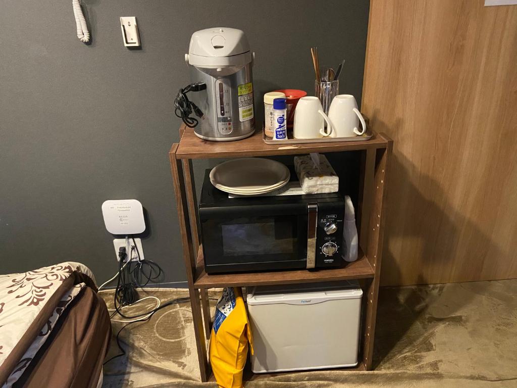 Kuchyň nebo kuchyňský kout v ubytování Hotel EL Shinjuku 6