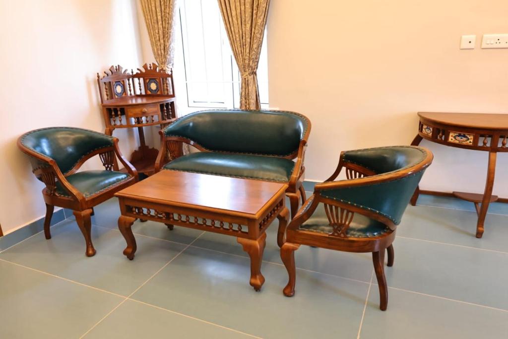 Posezení v ubytování Le Colonial Suites