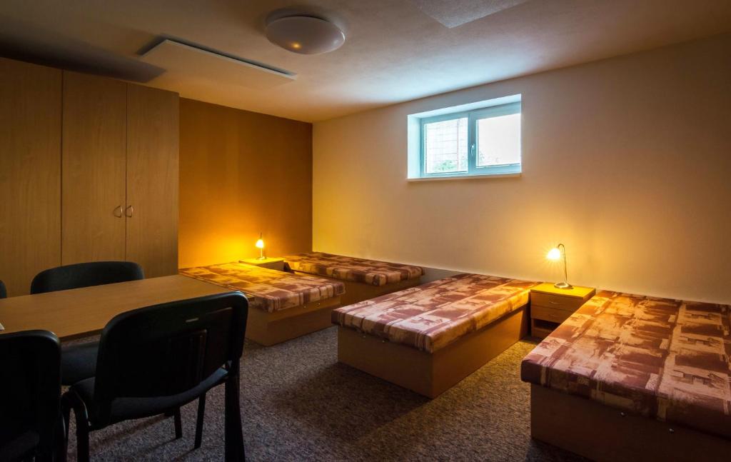 Postel nebo postele na pokoji v ubytování Ubytovňa Pali
