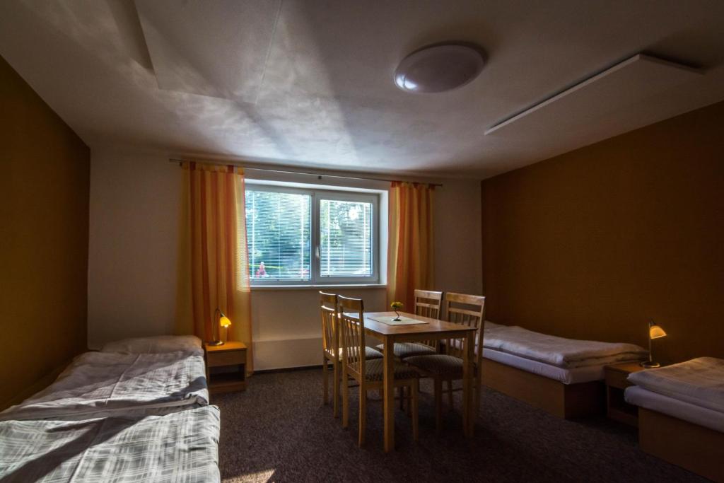 Postel nebo postele na pokoji v ubytování Ubytovňa Pali