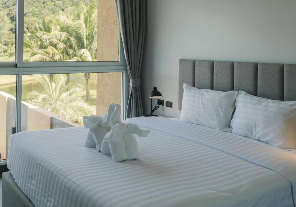 Postel nebo postele na pokoji v ubytování Private Pool Villa Melina - Koh Chang