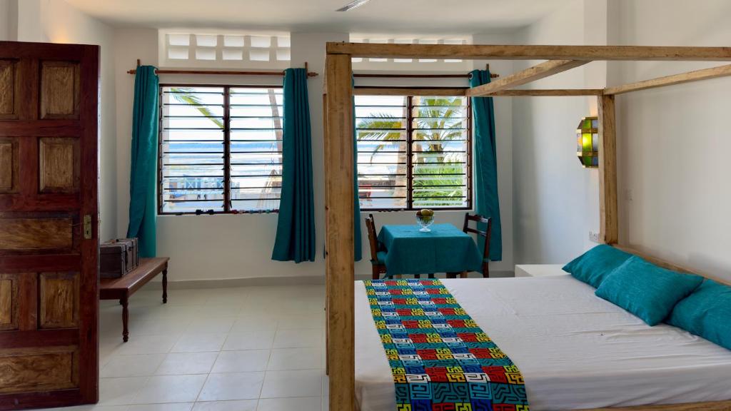 Postel nebo postele na pokoji v ubytování Sawa Sawa Beach House