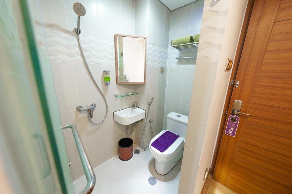 Koupelna v ubytování Heef Hotel