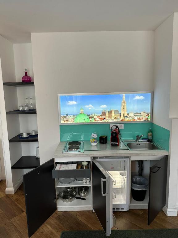 TV a/nebo společenská místnost v ubytování Versava Apartments