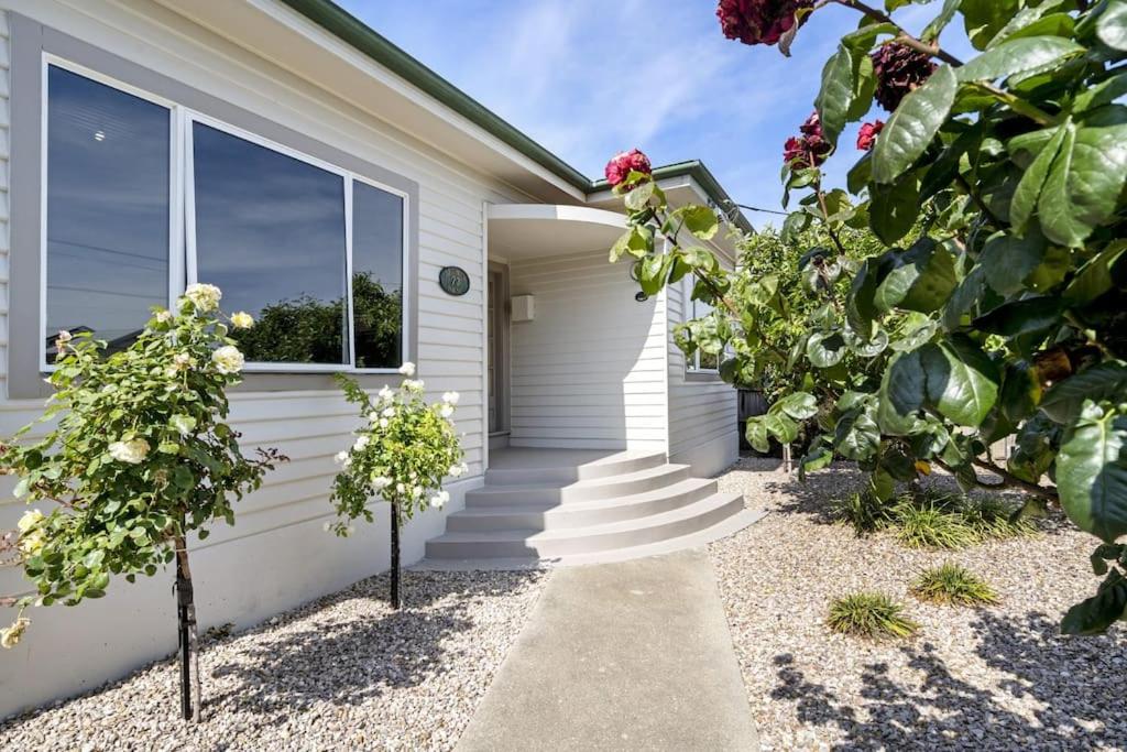 a house with a staircase leading to a garage at Bradman House CBD Launceston Invermay + Free WIFI in Launceston