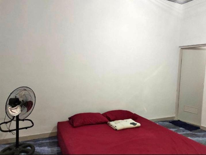 Tempat tidur dalam kamar di Homstay & vila