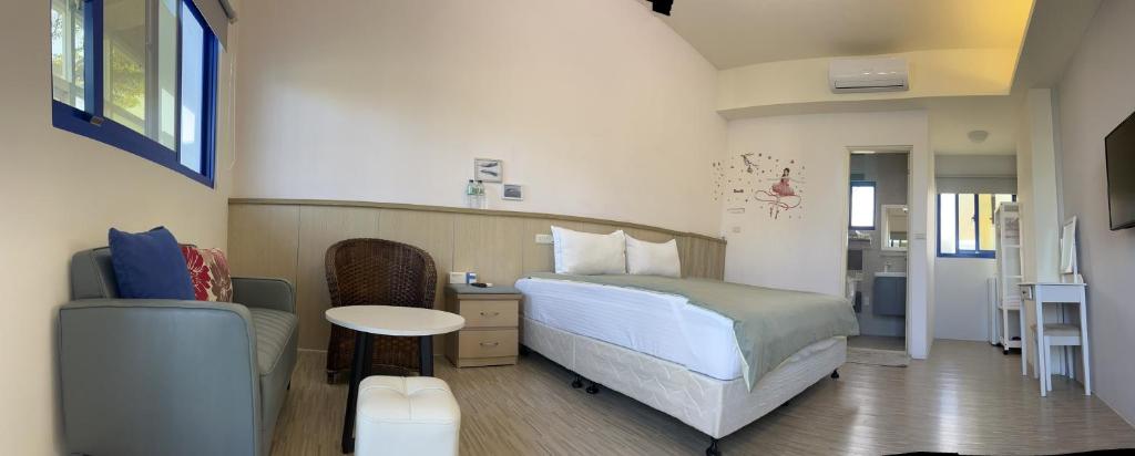 Postel nebo postele na pokoji v ubytování Haibian Mingren 50