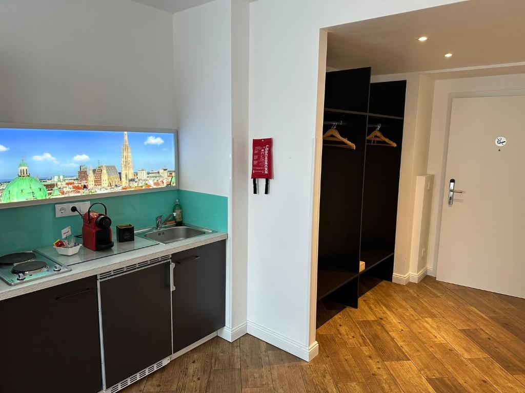 Kuchyň nebo kuchyňský kout v ubytování Versava Apartments