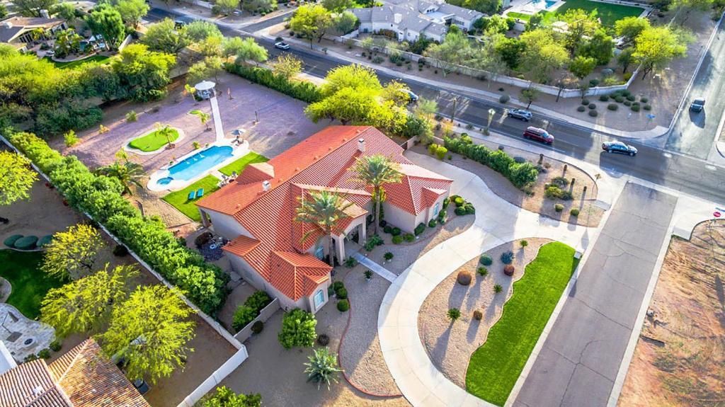 an overhead view of a house with a swimming pool at Paradise Valley by AvantStay Expansive Oasis w Putting Green Pool Mtn Views in Scottsdale