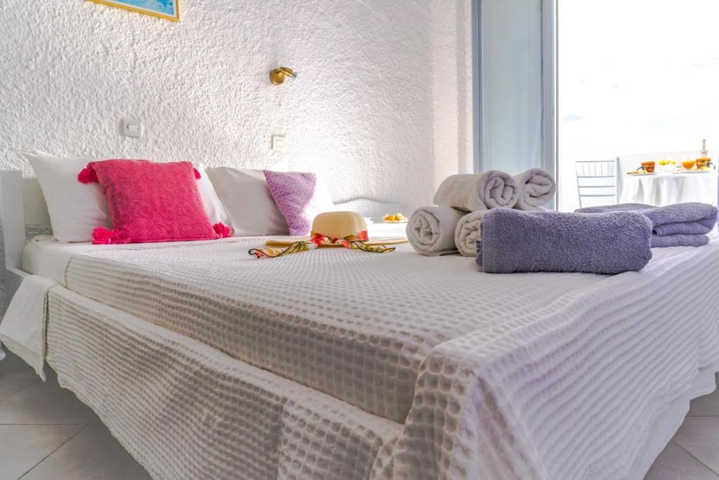 Uma cama ou camas num quarto em Smarula Villa