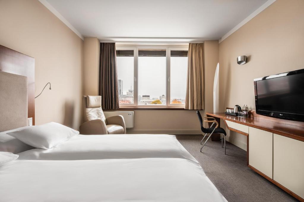 TV a/nebo společenská místnost v ubytování Eurostars uHOTEL