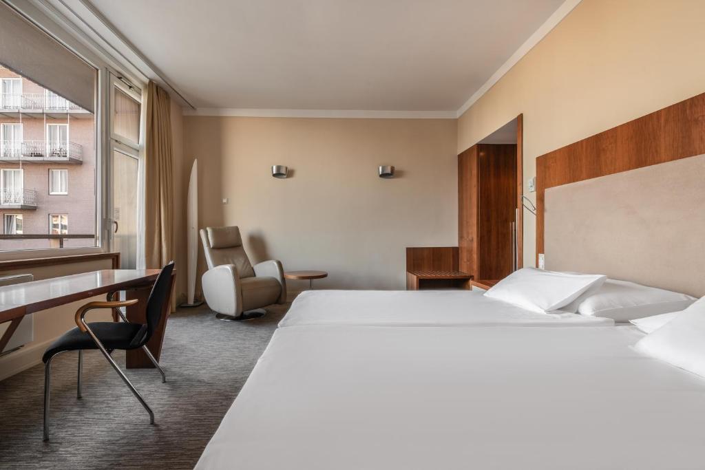 Postel nebo postele na pokoji v ubytování Eurostars uHOTEL
