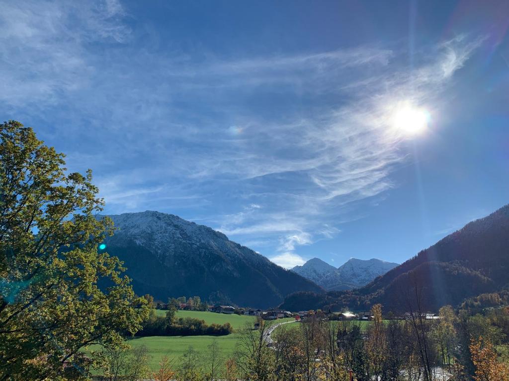 a view of a valley in the mountains at alpinzeit.bayern Tanja und Thomas Preinfalk in Ruhpolding