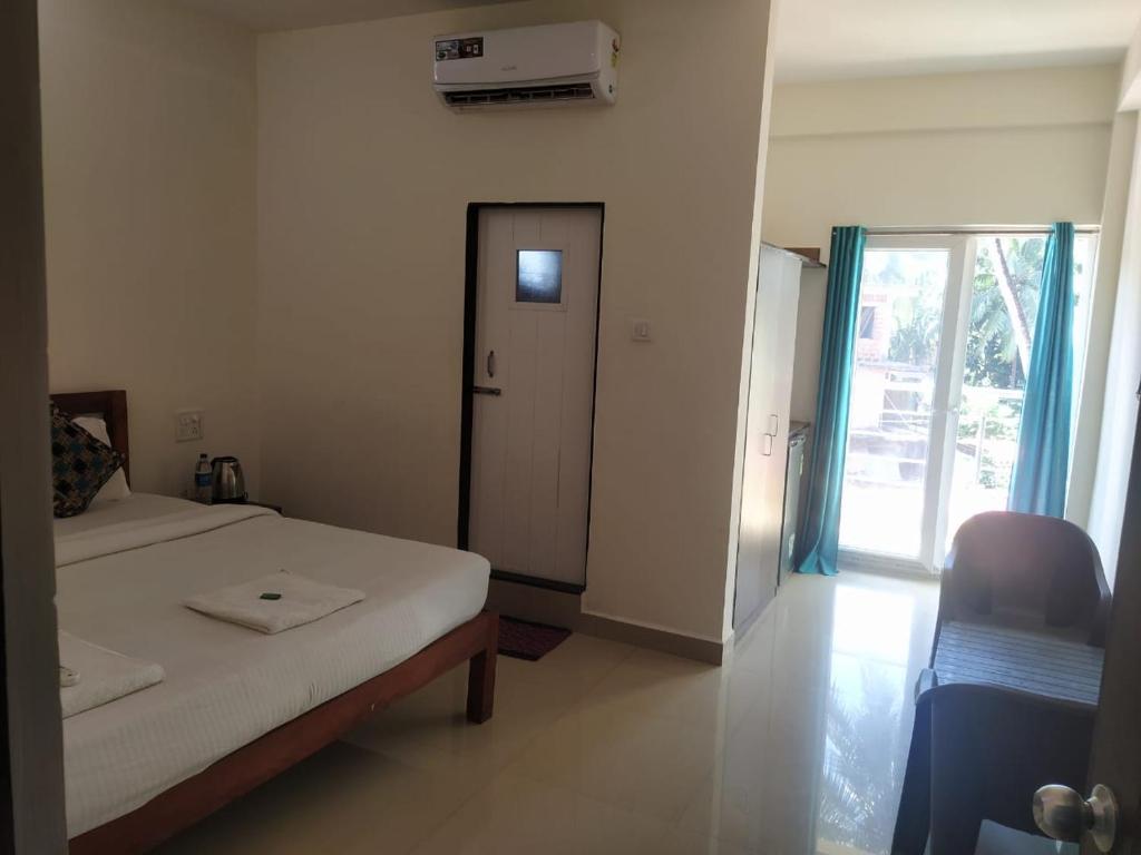 Postel nebo postele na pokoji v ubytování Hotel Baga inn