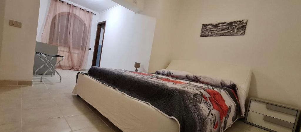 Postel nebo postele na pokoji v ubytování Al focolare di Enzo