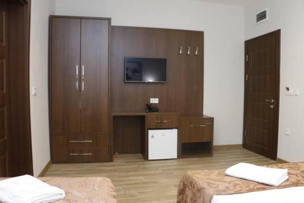 Postel nebo postele na pokoji v ubytování AEN Hotel-Old City
