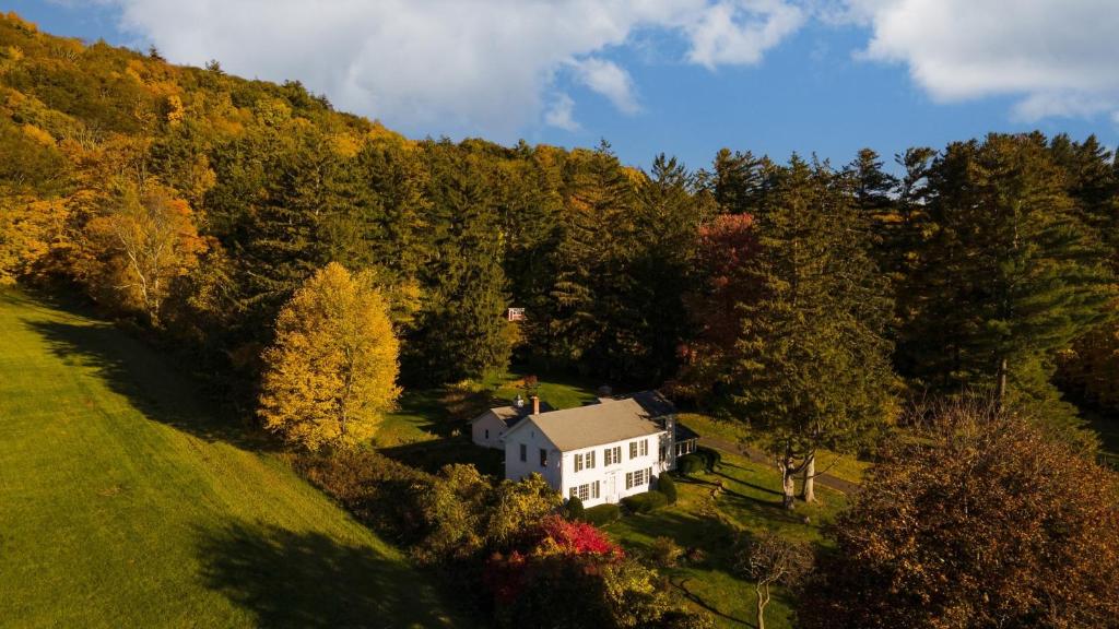an aerial view of a house on a hill at Whitney by AvantStay Private Berkshires Estate in Sheffield