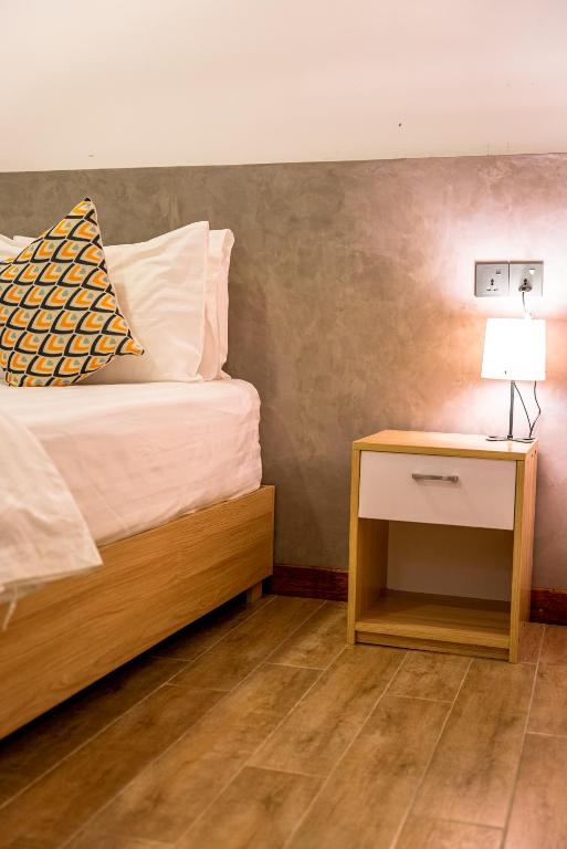Postel nebo postele na pokoji v ubytování Holiday Crib