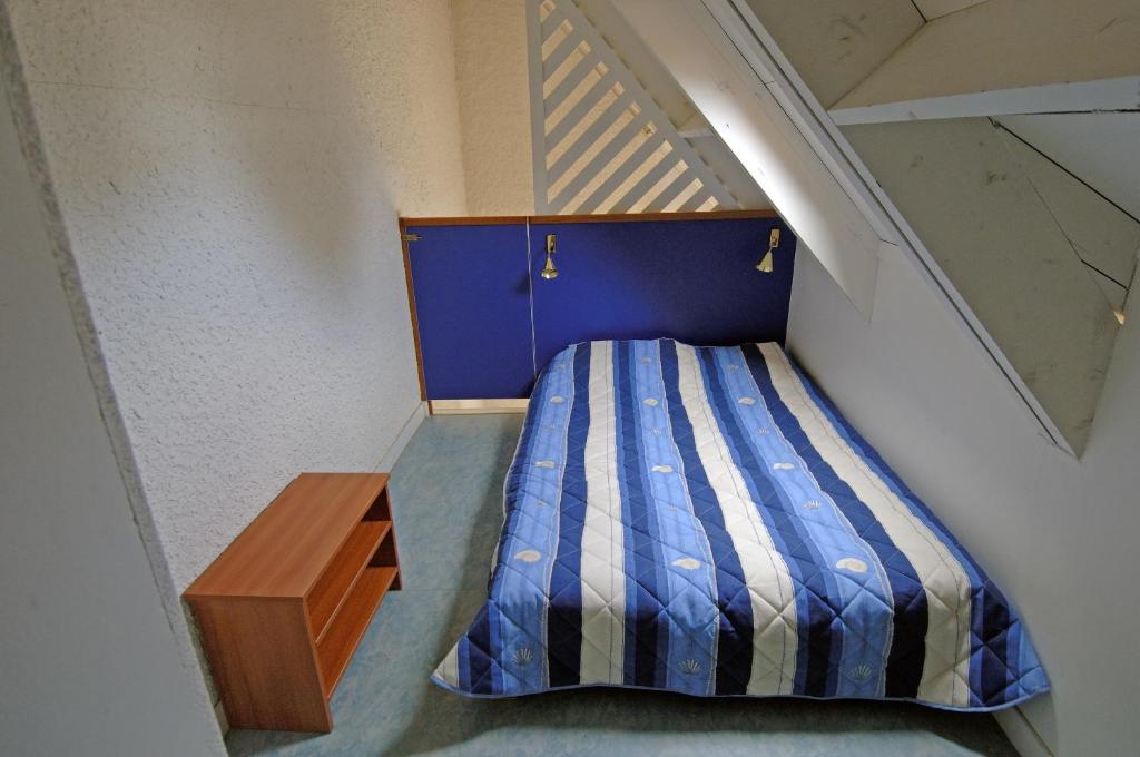 Postel nebo postele na pokoji v ubytování VVF Belle-Île-en-Mer
