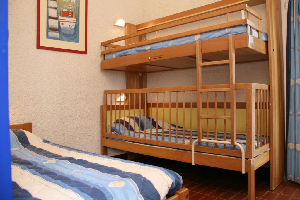 Postel nebo postele na pokoji v ubytování VVF Belle-Île-en-Mer