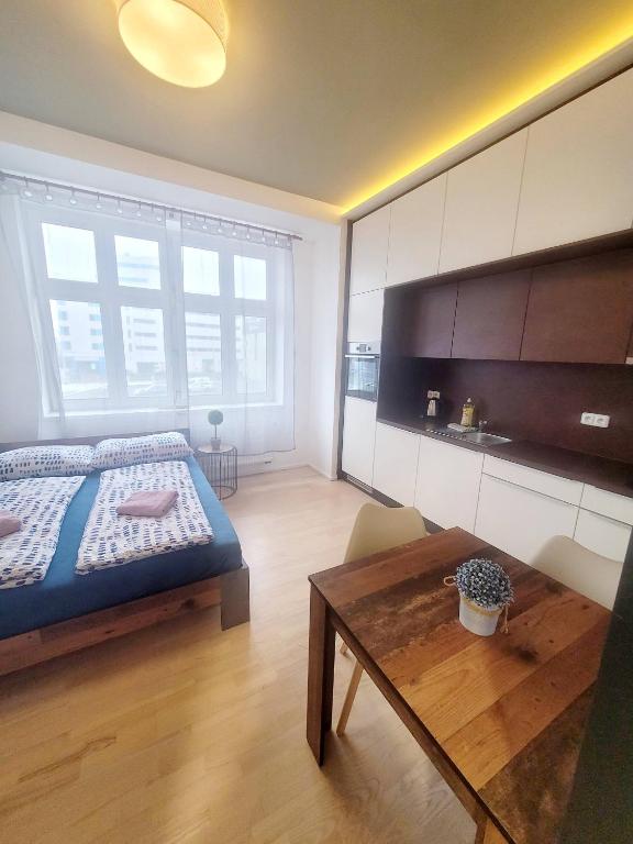Postel nebo postele na pokoji v ubytování Skořepka15 apartment Brno-střed
