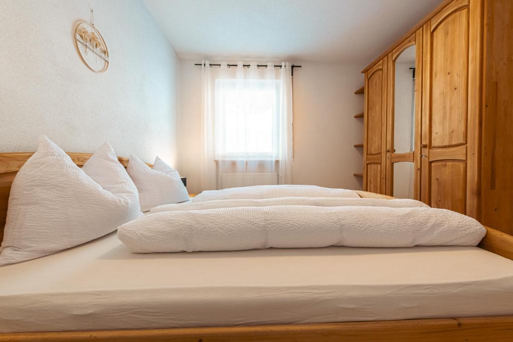 Postel nebo postele na pokoji v ubytování Felda Appartements