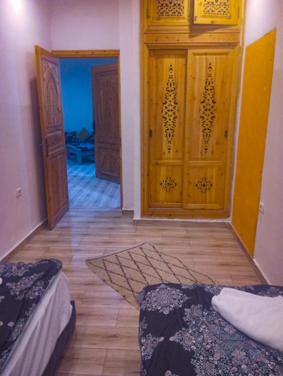 Postel nebo postele na pokoji v ubytování Hostel Ghali & Private Rooms Gueliz