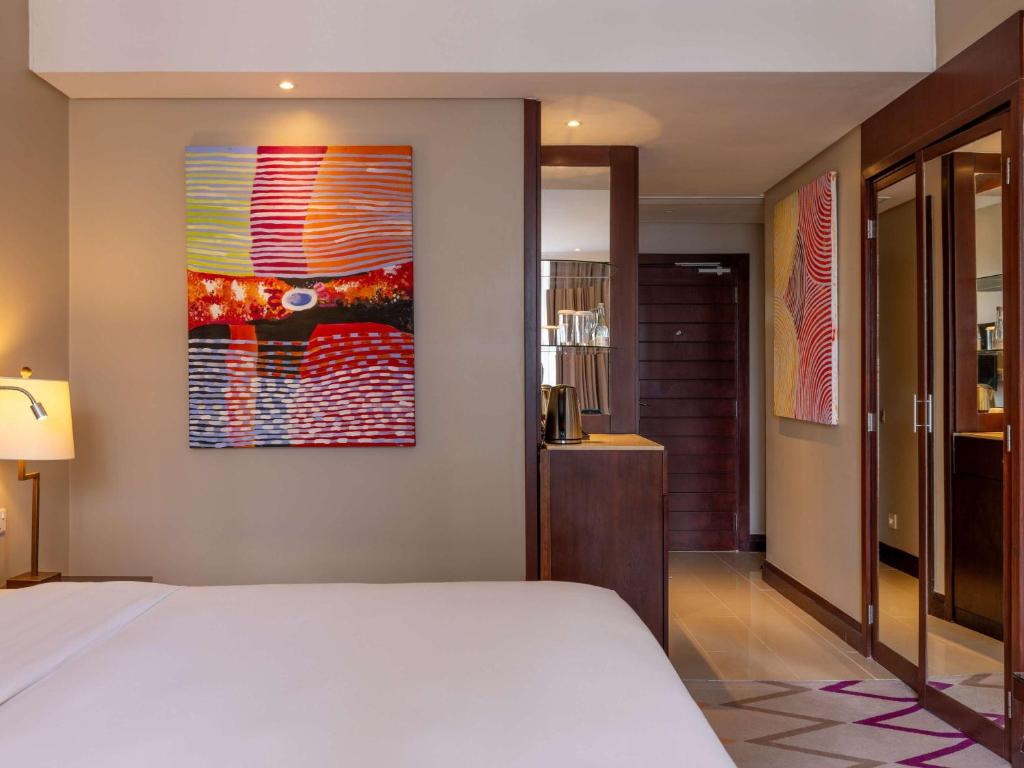 Postel nebo postele na pokoji v ubytování Mercure Nairobi Upper Hill