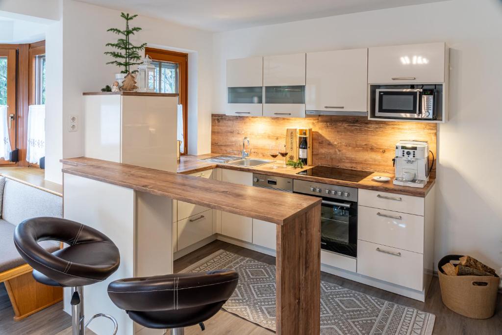 Kuchyň nebo kuchyňský kout v ubytování Haus Sonnengarten-Lienz